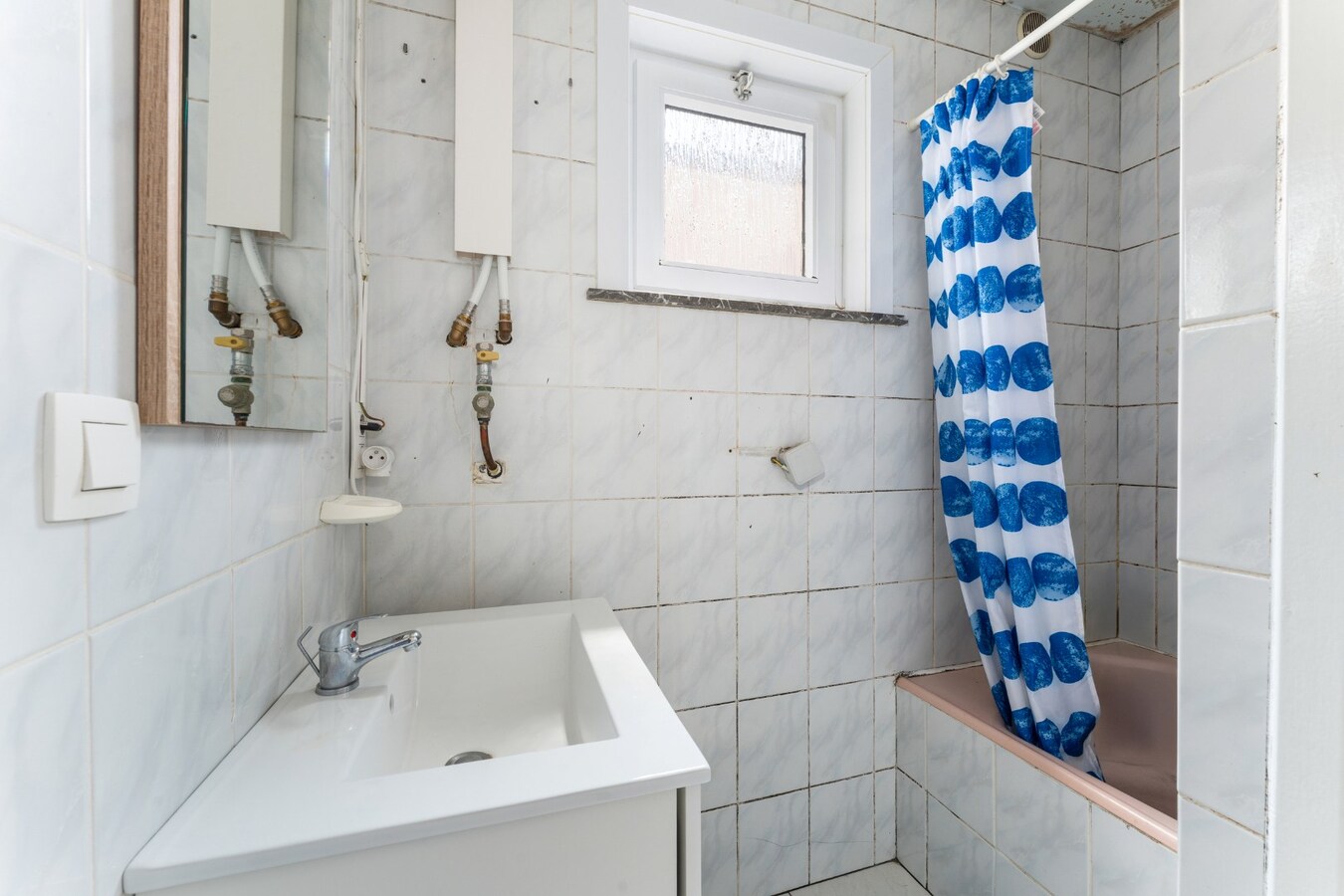 Centrale rijwoning met drie slaapkamers en terras in hartje Roeselare 