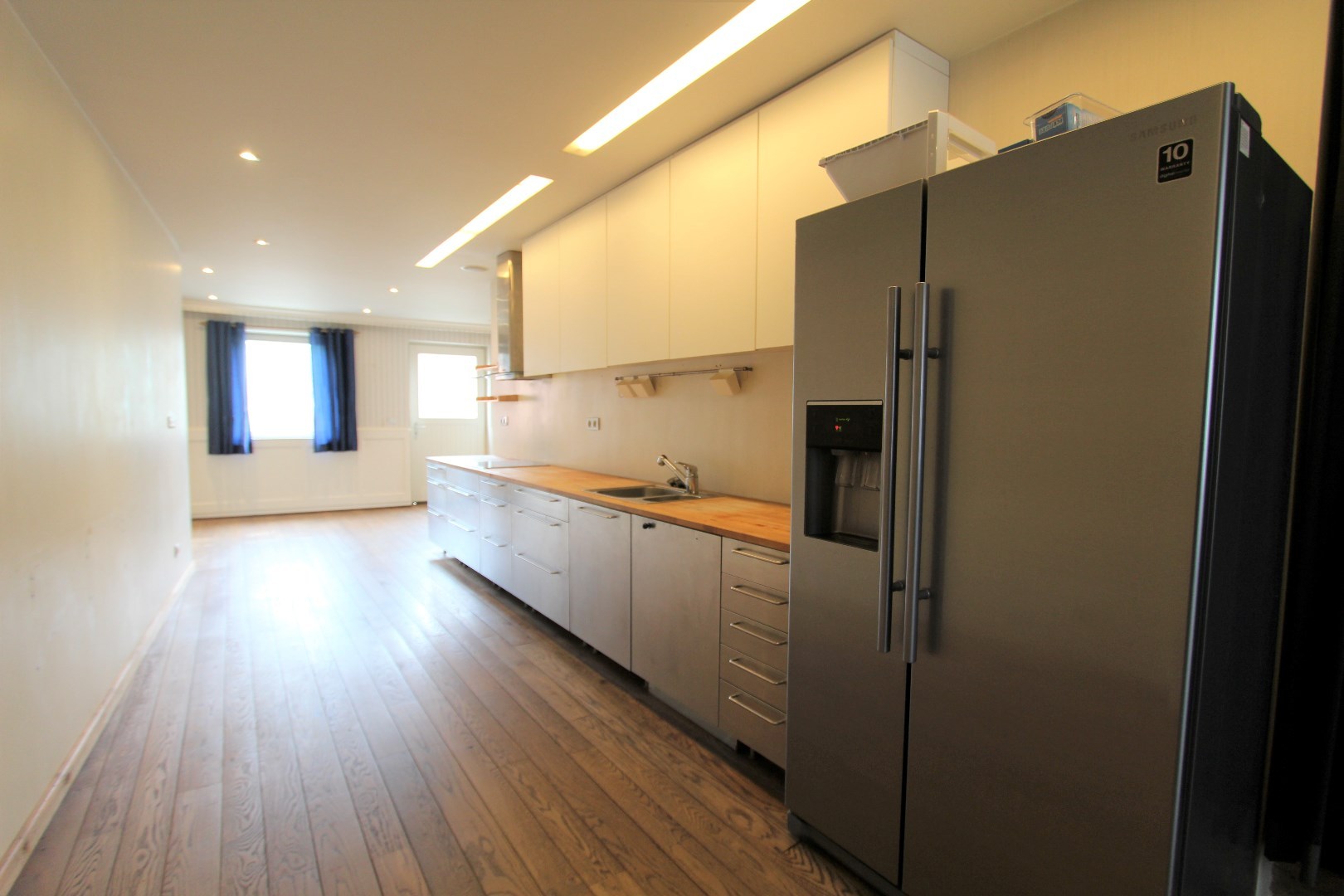 PRACHTIG GELEGEN MODERNE HANDELSWONING 