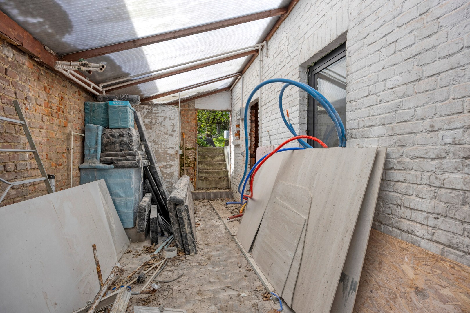 Gerenoveerd handelshuis met aangename tuin en garage op goede ligging in Herent 