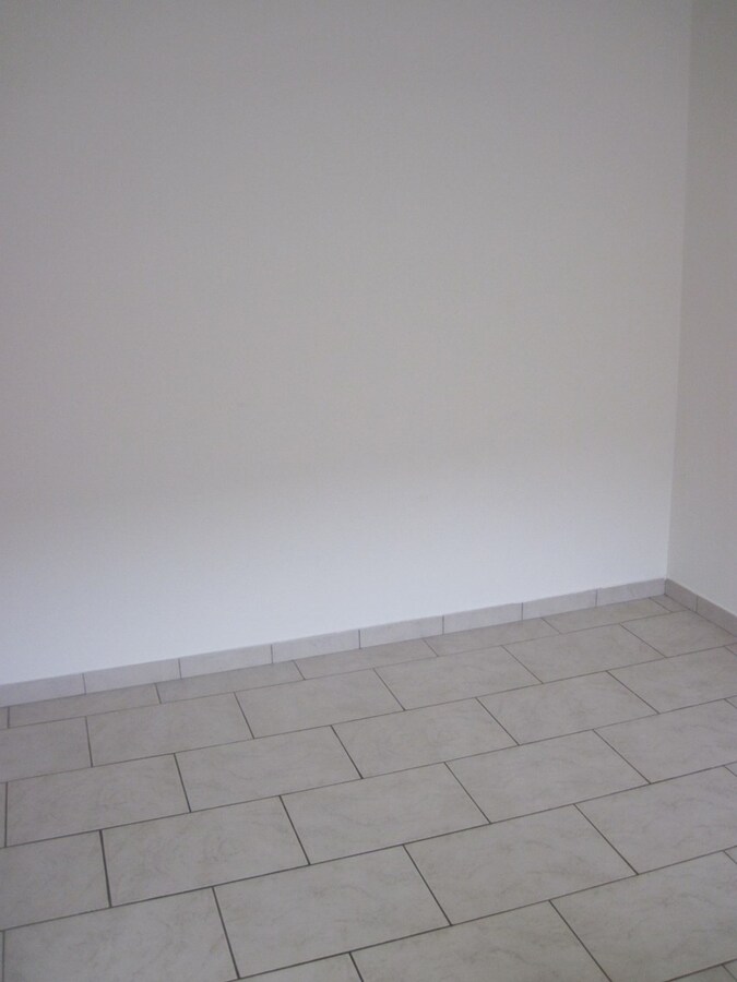 Bijzonder ruim appartement in hartje Kruishoutem. 