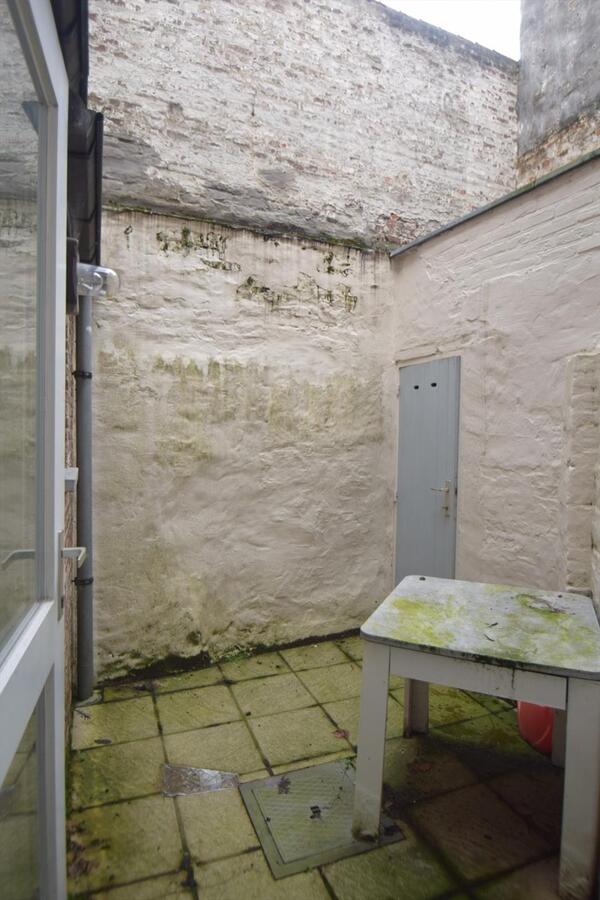 Goedgelegen 1-slpk-appartementje op gelijkvloers met koer vlakbij Vismarkt 