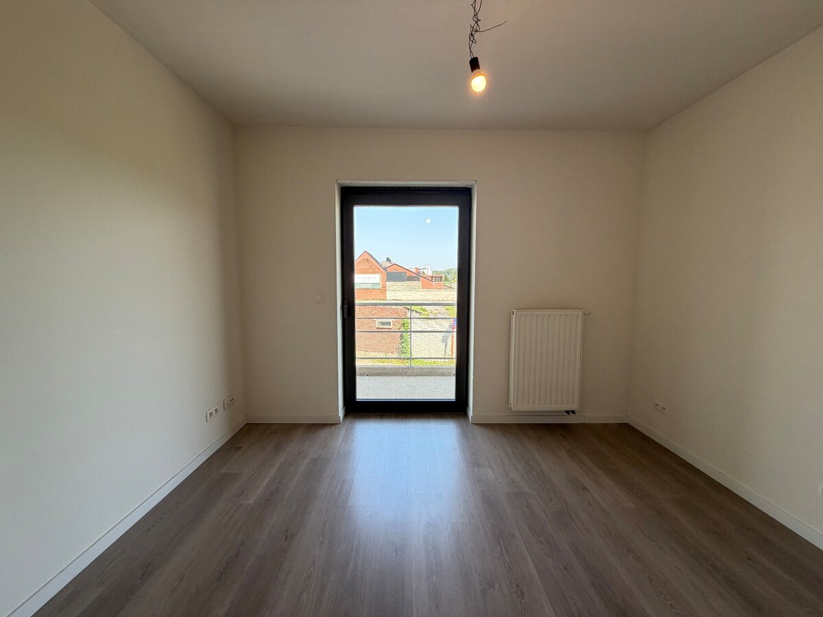 2 slpk-appartement nabij allerhande voorzieningen. 
