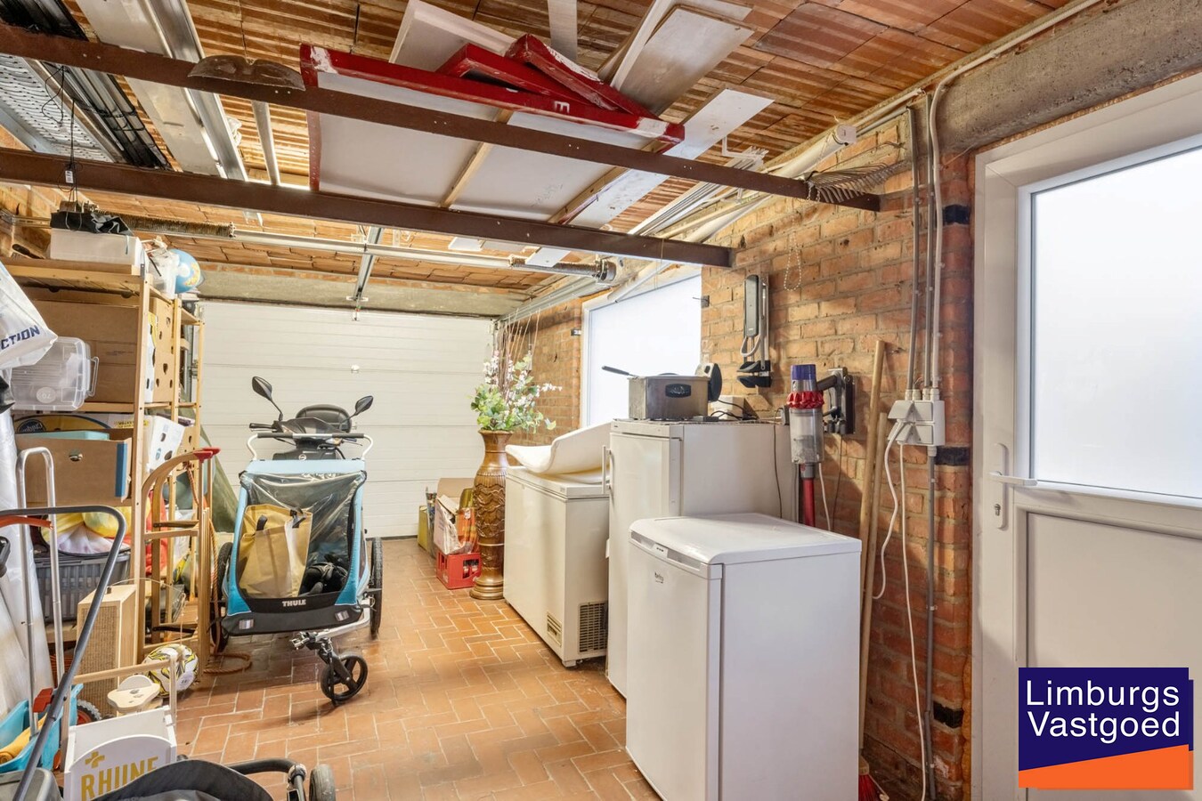 Stadswoning met 4 slpk, zuidgerichte tuin en garage, nabij kleine ring, station en Vredespark 