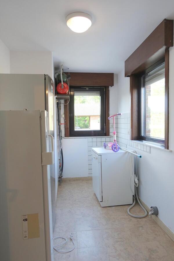 Gezellige half-open woning met zonnige tuin 