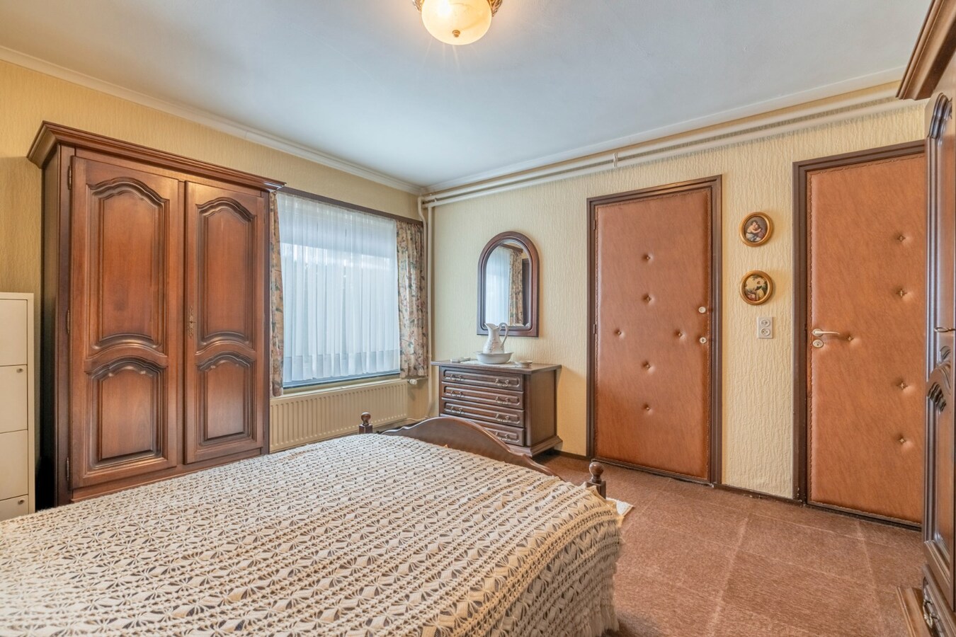 Rustig gelegen gelijkvloerse woning met garage en 3 slaapkamers in Niel-bij-As . 