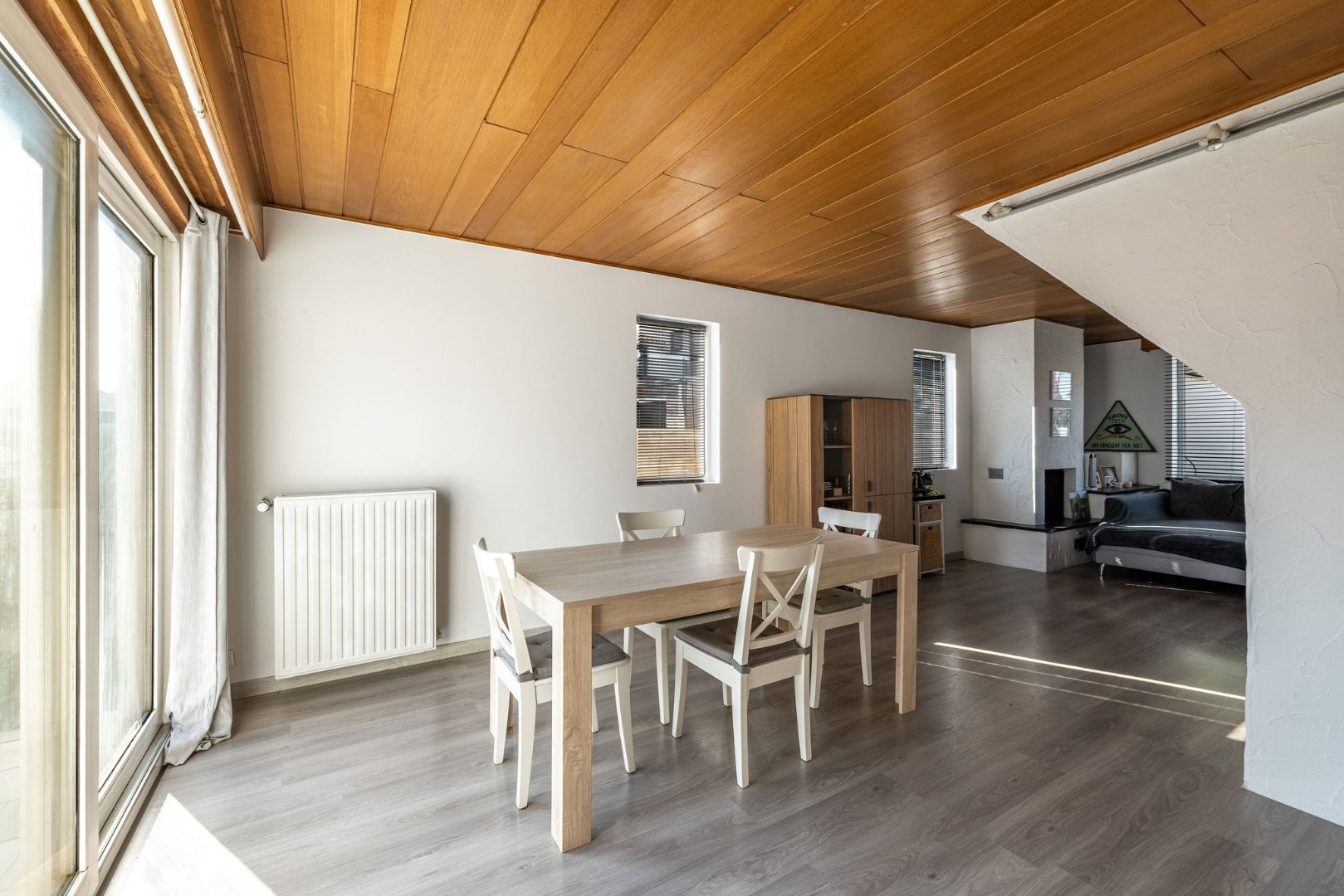 Authentieke woning met zonnige tuin, garage en bouwgrond 