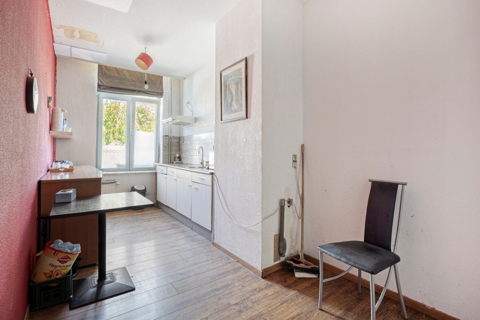 Handelshuis met horecazaak, 2 appartementen en luxueuze loft op toplocatie in Leopoldsburg 