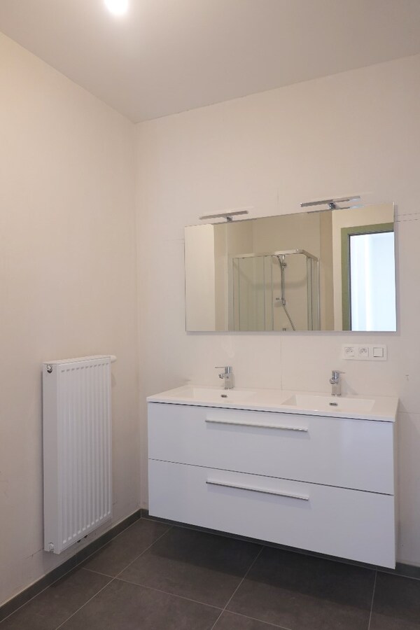 Nieuwbouwappartement in centrum met dubbel garage 