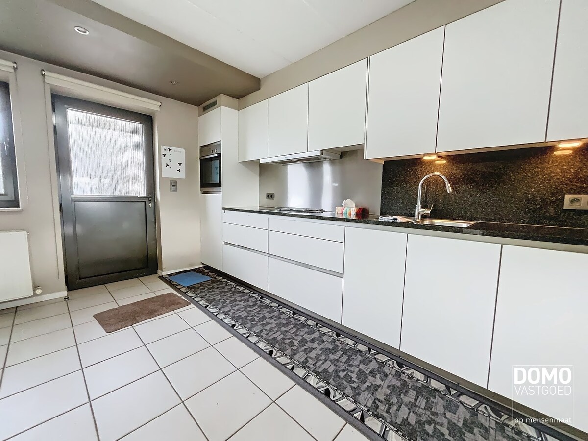 RUIM APPARTEMENT MET TUIN EN 2 SLAAPKAMERS TE HUUR IN HEUSDEN-ZOLDER 