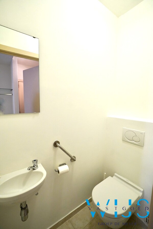 Gelijkvloers appartement met ruim terras in het centrum Ertvelde ! 