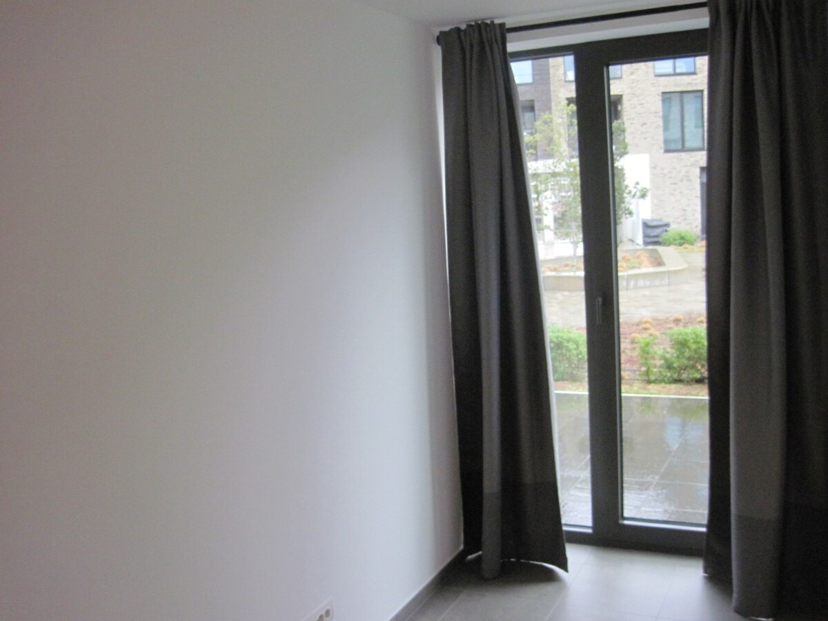 Gelijkvloers 2-slaapkamer appartement met uitzonderlijk terras. 