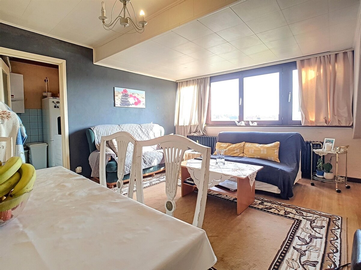 Dakppartement aan het marktplein te Heist 