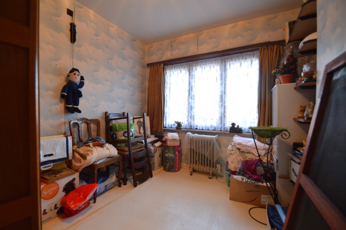 Volumineuze, te renoveren woning met garage - Heist 