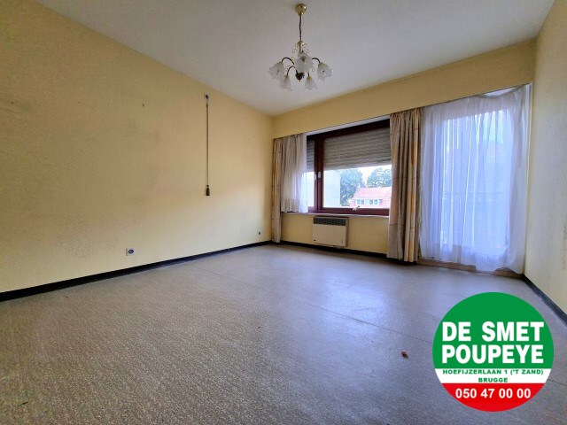 Ruime rijwoning met garage en tuin 