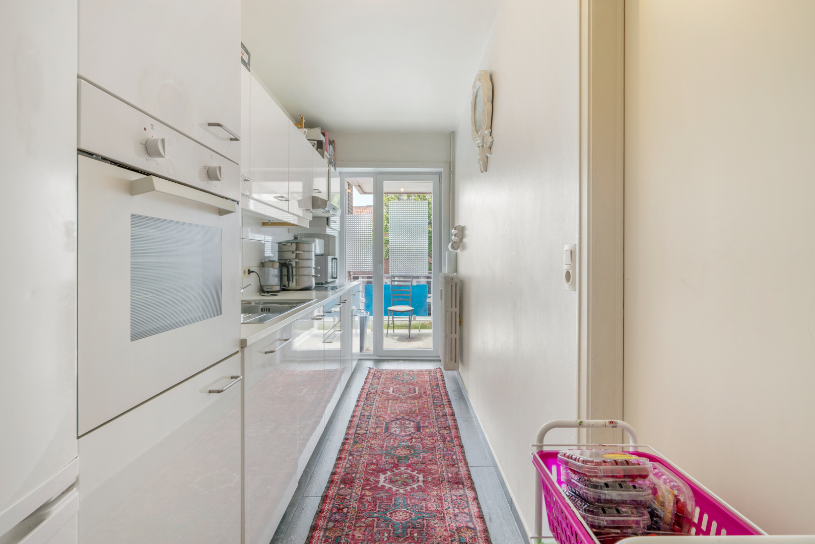 OPBRENGSTEIGENDOM MET 7 APPARTEMENTEN EN 7 GARAGEBOXEN 