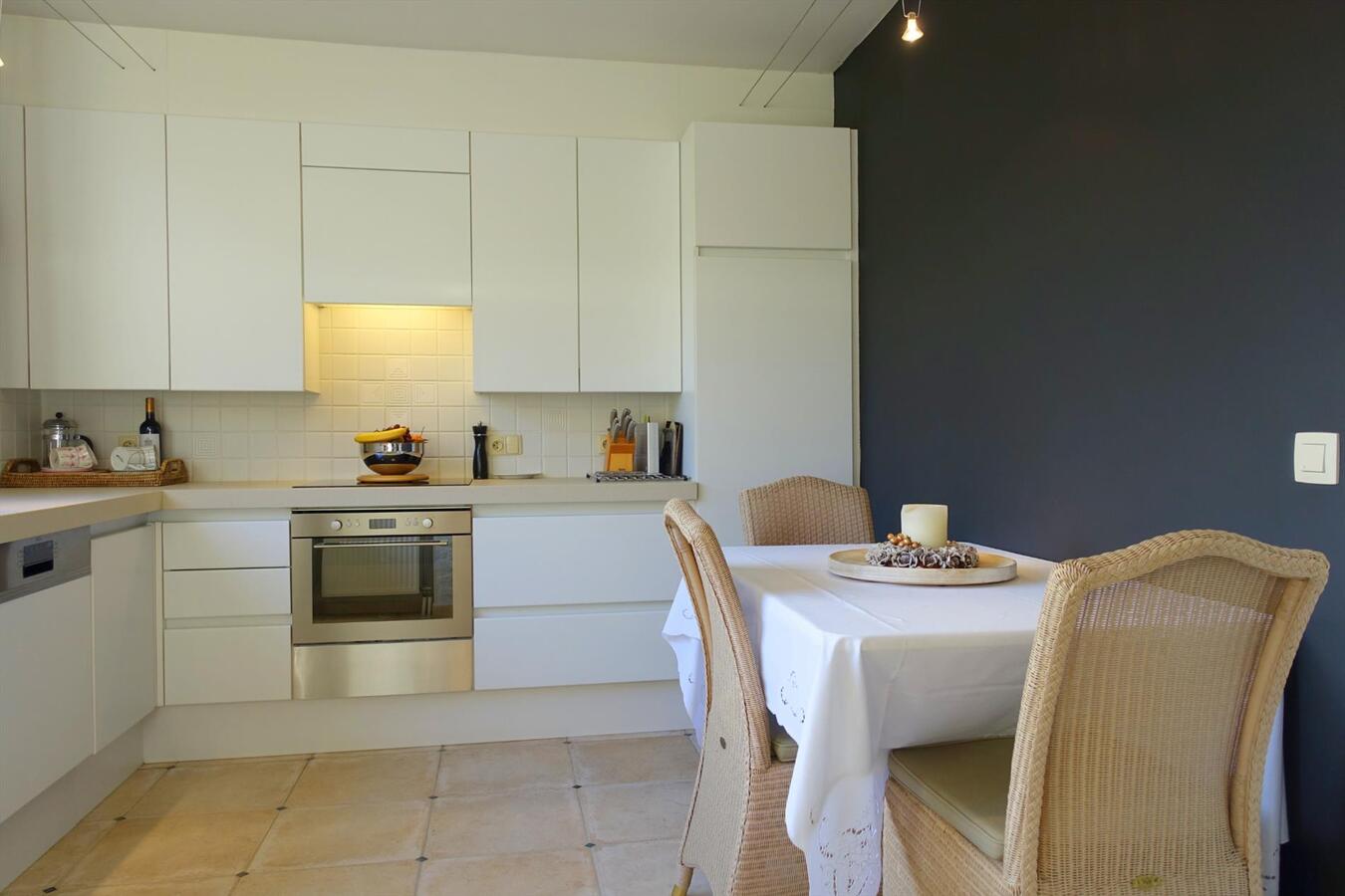 Gelijkvloers appartement met zuidgerichte tuin 