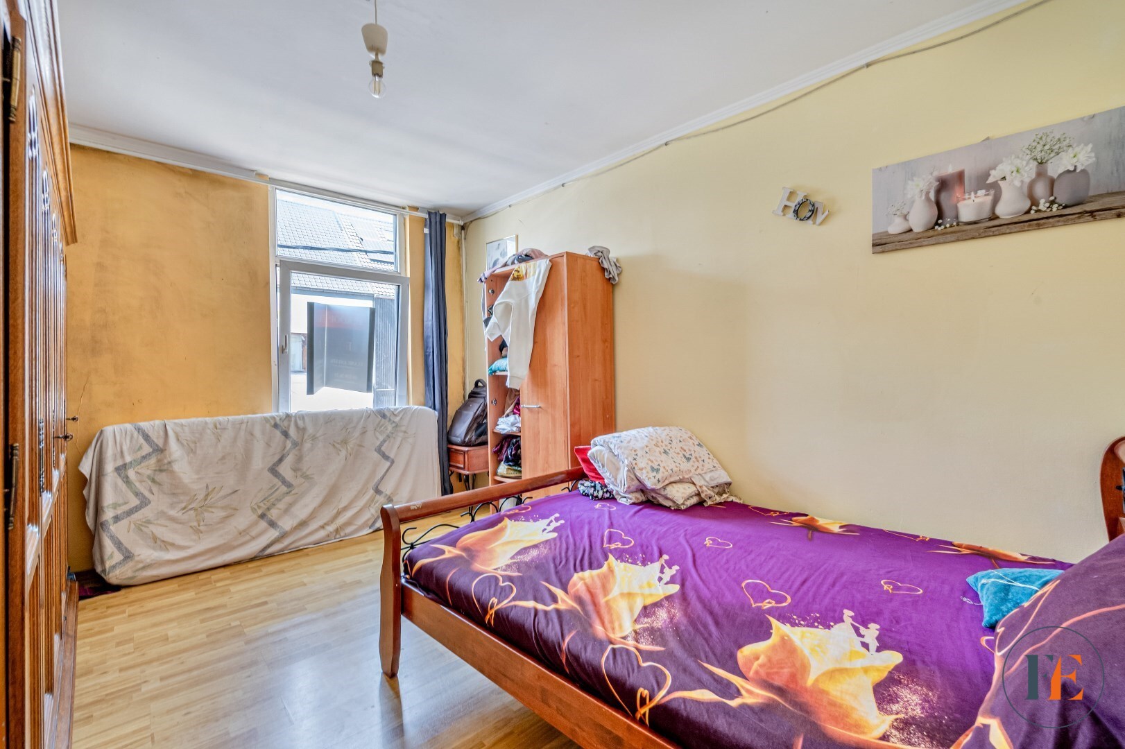 Te renoveren woning met stadskoer 