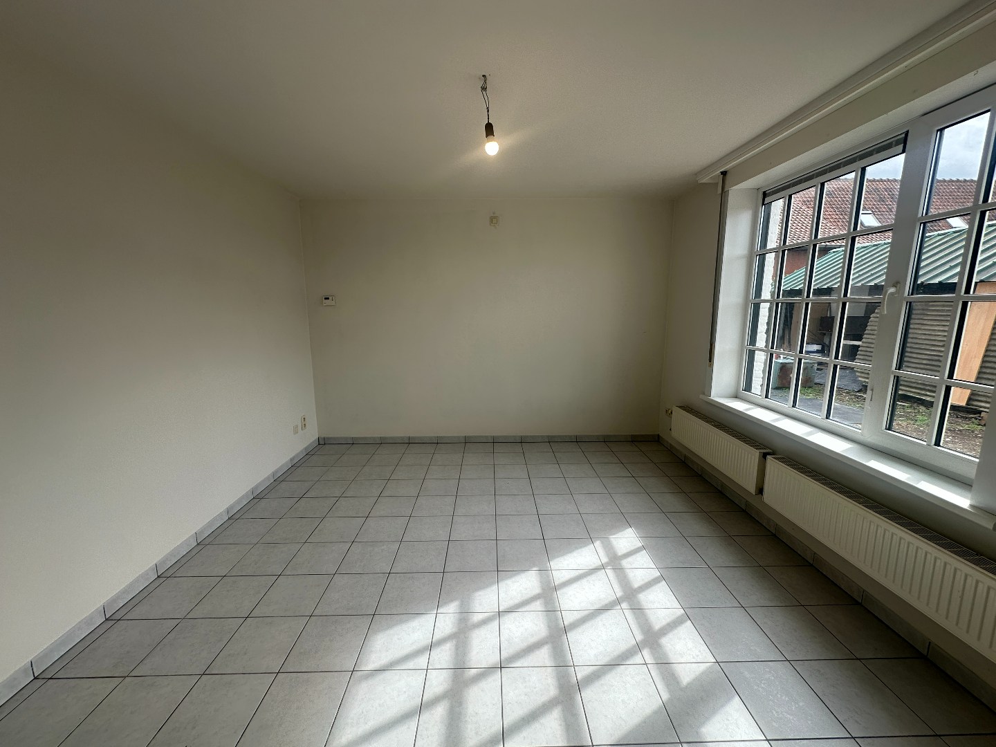Gelijkvloerse slaapkamer/hobbyruimte