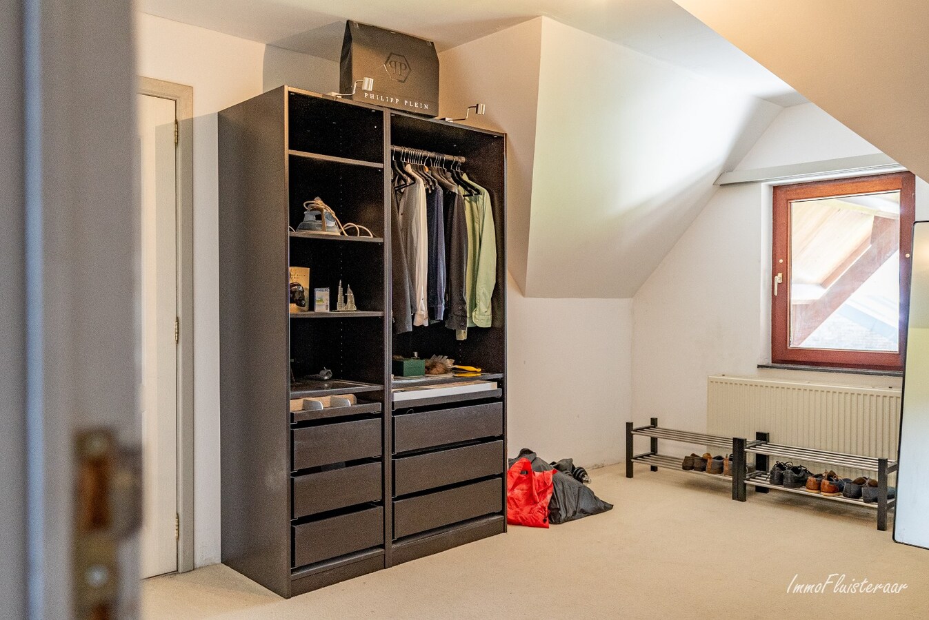 Ruime woning met paardenstallen op ca. 85 are te Kinrooi 