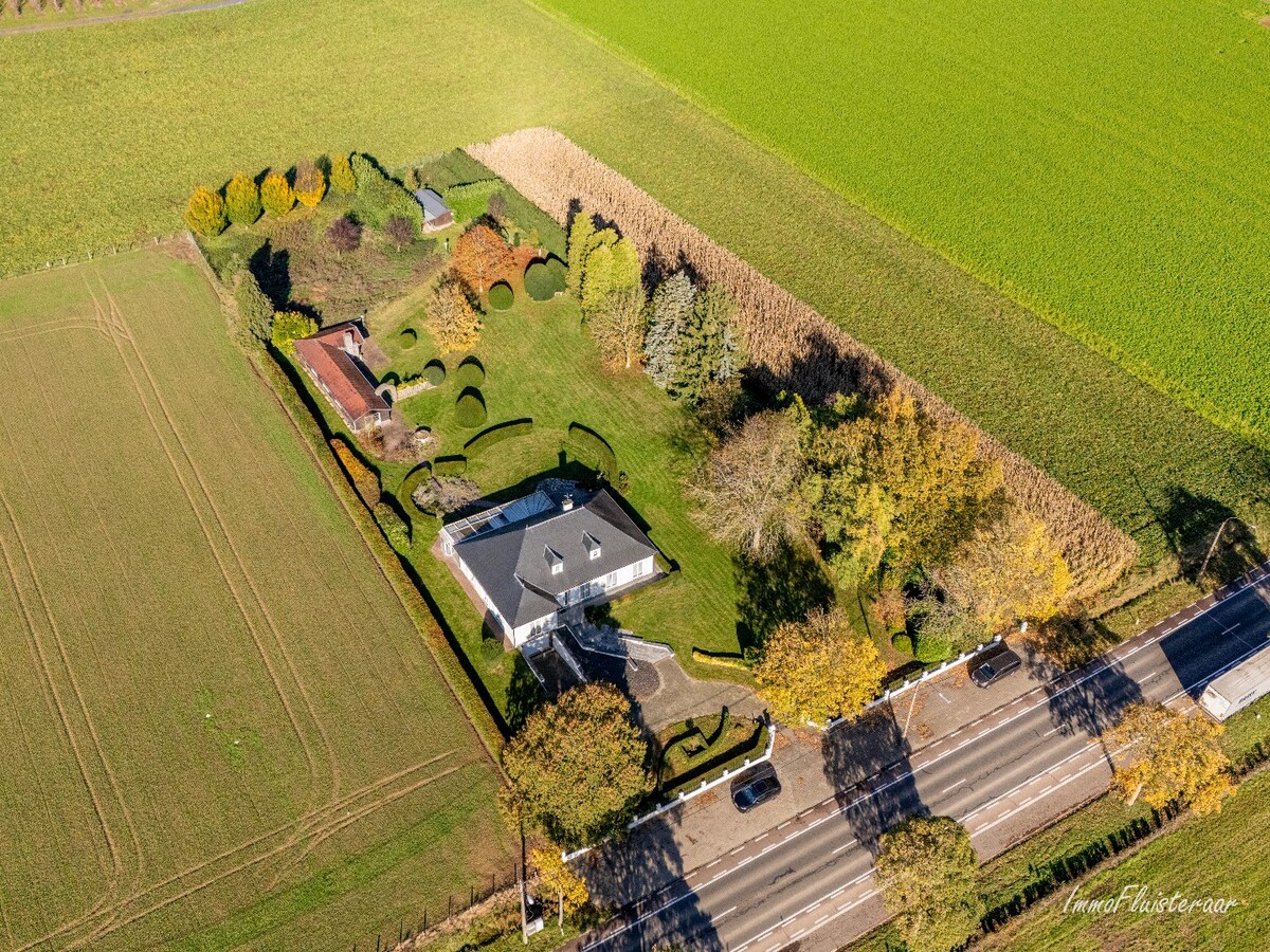 Rural villa with multifunctional outbuilding on approximately 51 acres in Bilzen 