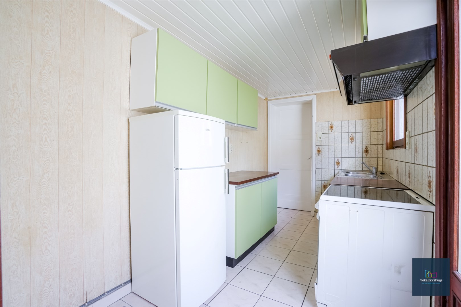 Centraal gelegen te renoveren woning in rij met tuin te Mariakerke 