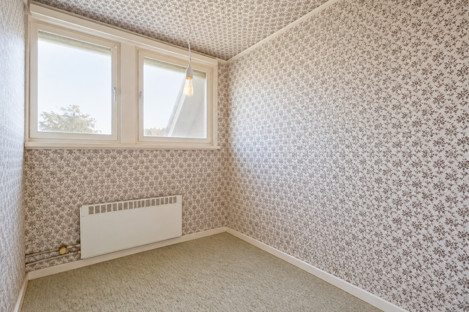 Halfopen woning met zongerichte tuin vlak bij het centrum van Veurne 