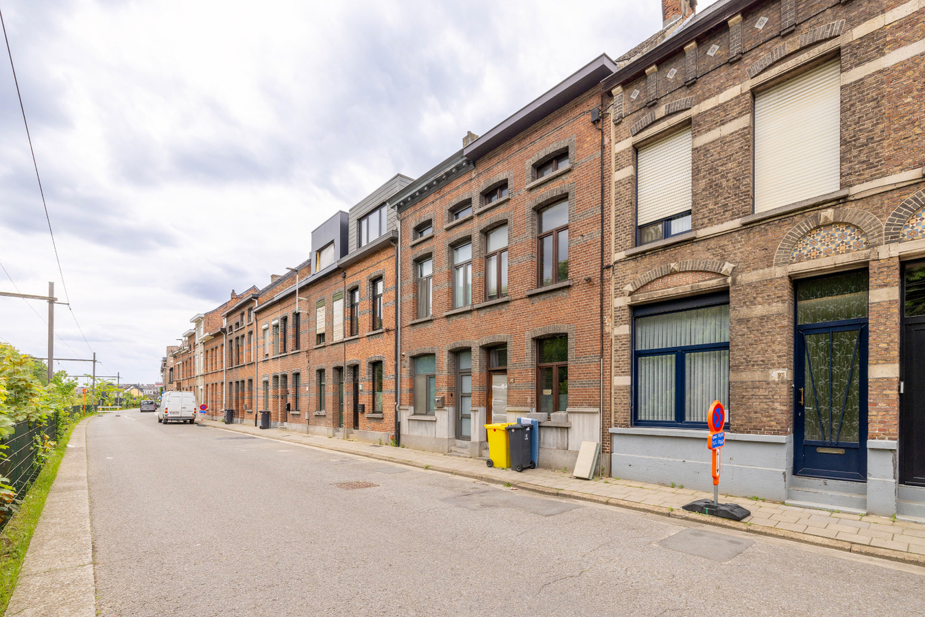 Stadswoning - 3/4 slpks - tuin - uitweg achteraan 