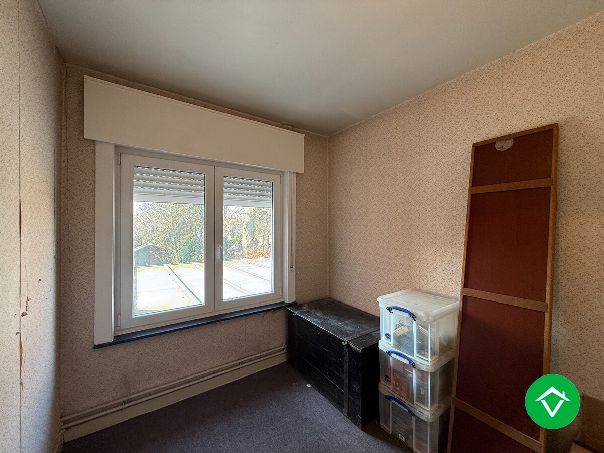 Stevige rijwoning met 4 slaapkamers, tuin en garage te Roeselare 