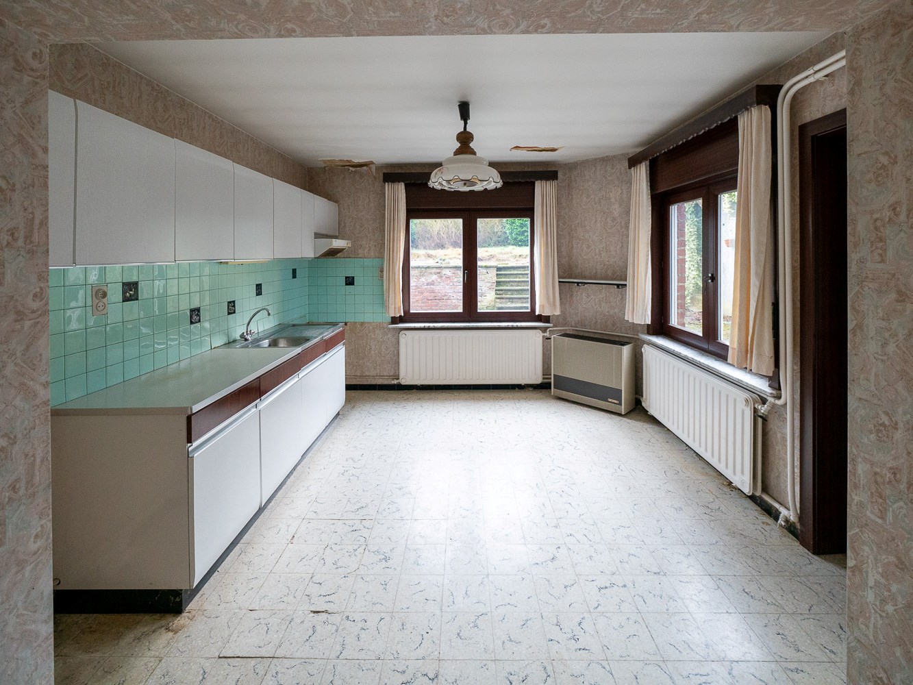 Te renoveren woning in het centrum van Schepdaal 