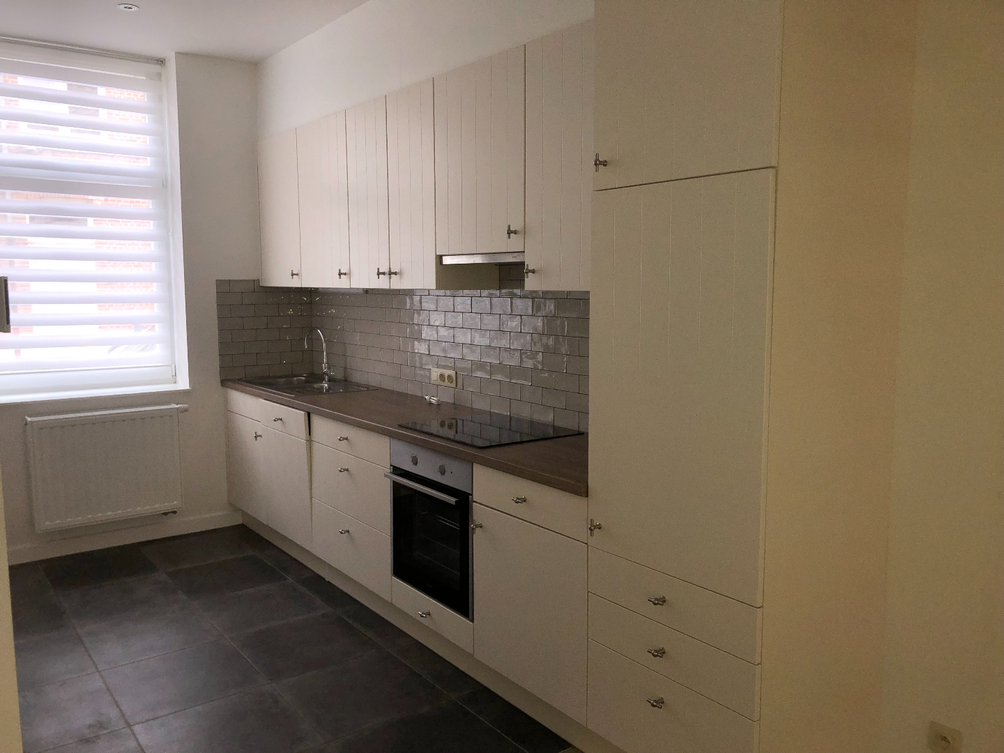 Instapklare woning met 2 slpks en stadstuin 