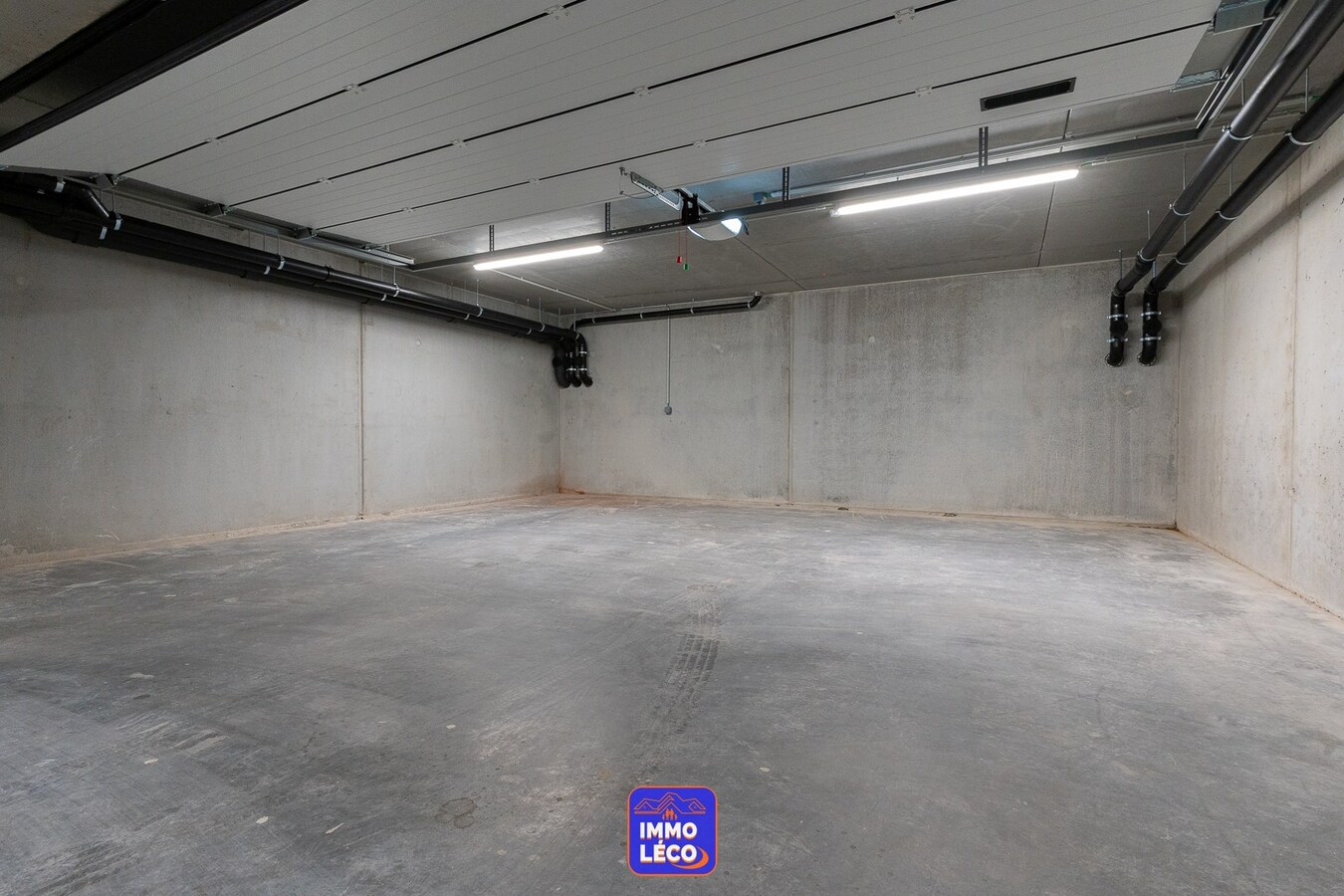 Appartement NEUF de haut standing avec garage 3 voitures, EN PLEIN CENTRE-VILLE ! 