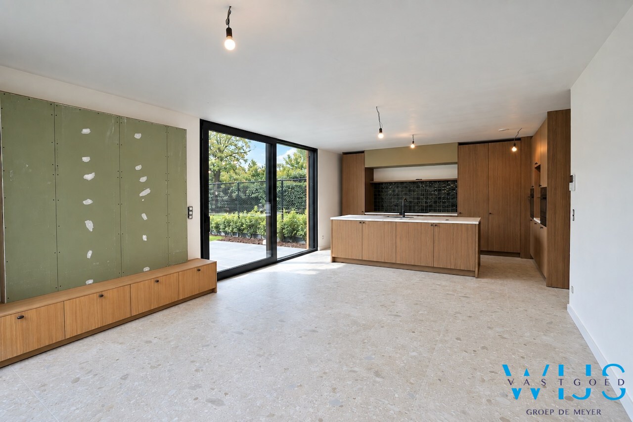 High-end gelijkvloers appartement met tuin te Lembeke ! 