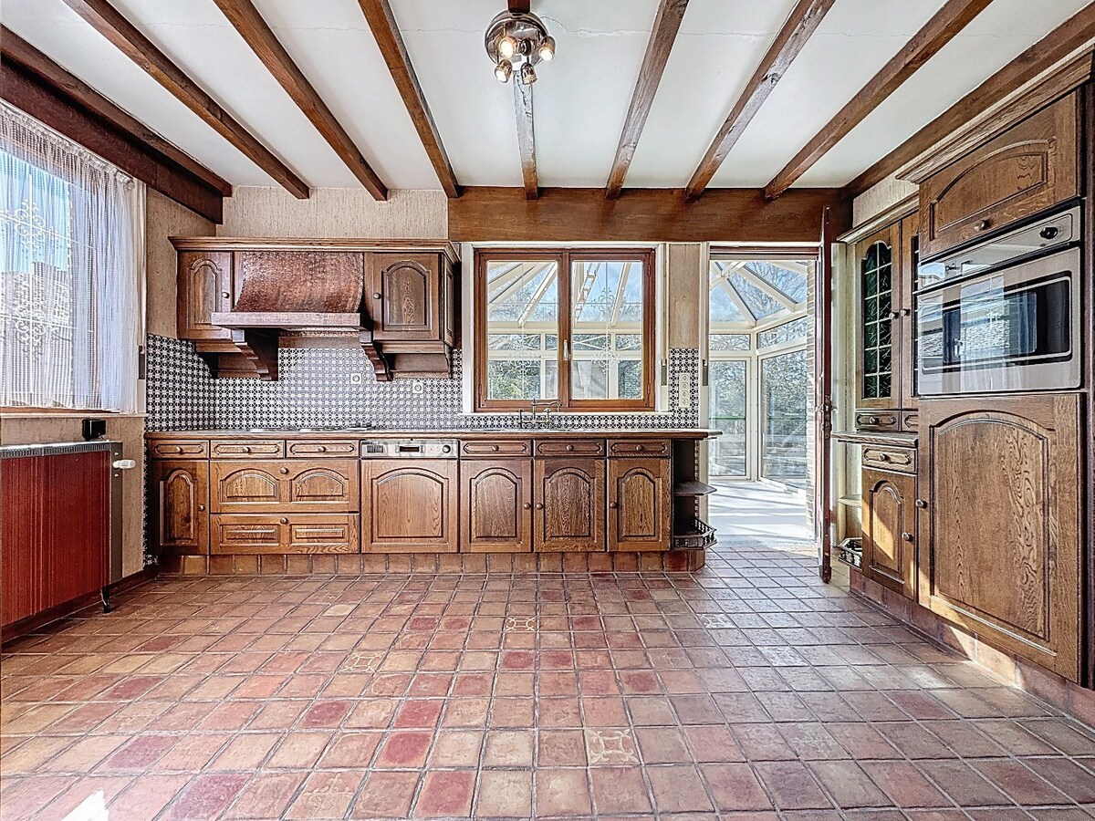 Statige laagbouwvilla met groene achteruit te Scheldewindeke 