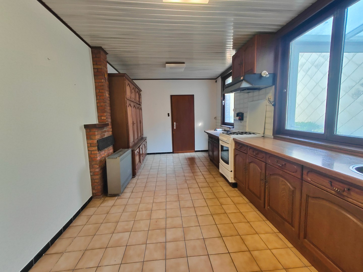Unieke woning met achterliggende tuin  in het centrum van Pittem 