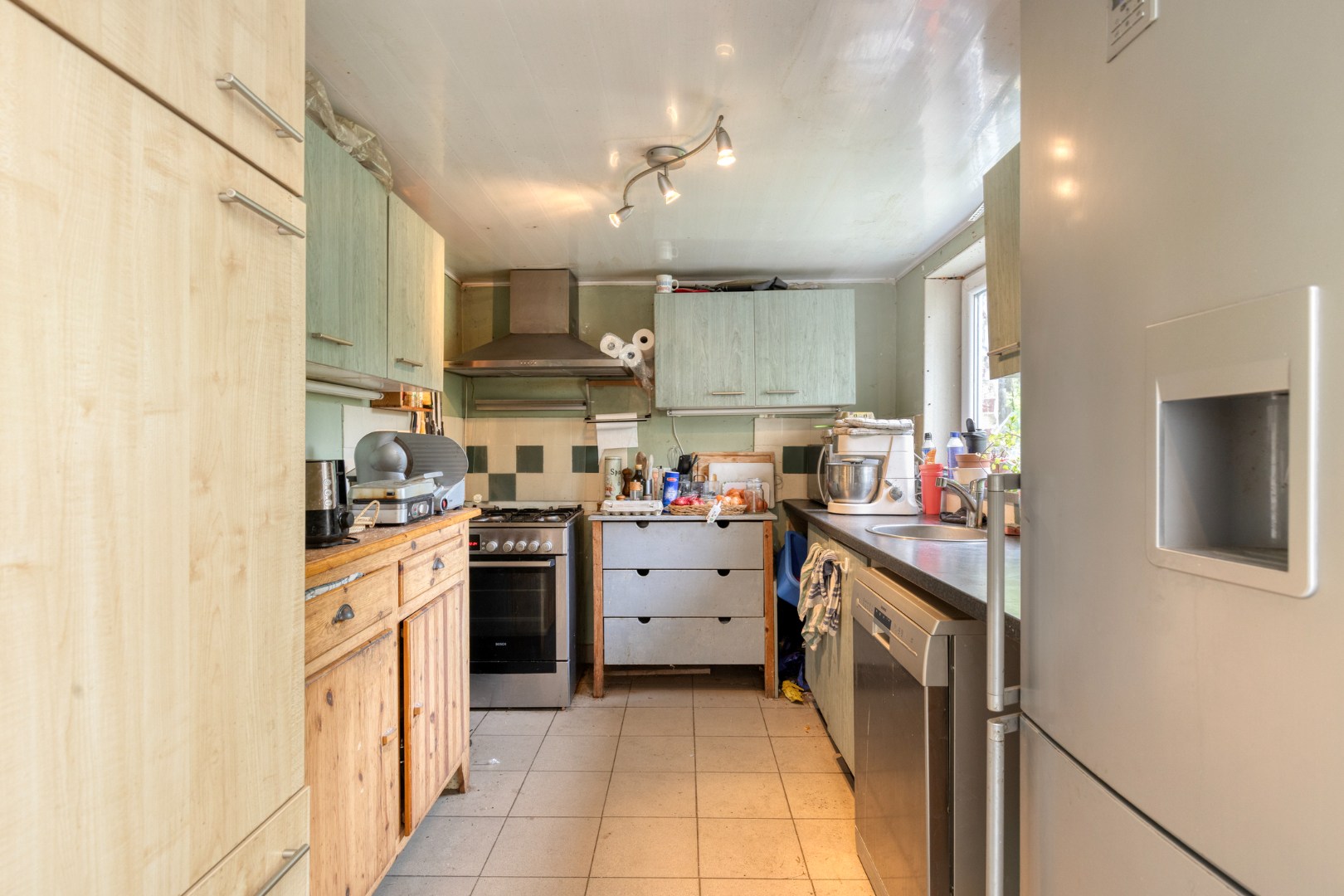 Halfopen bebouwing met 5 ruime slaapkamers, 2 badkamers, garage en tuin in Holsbeek – bewoonbare oppervlakte 214m² 