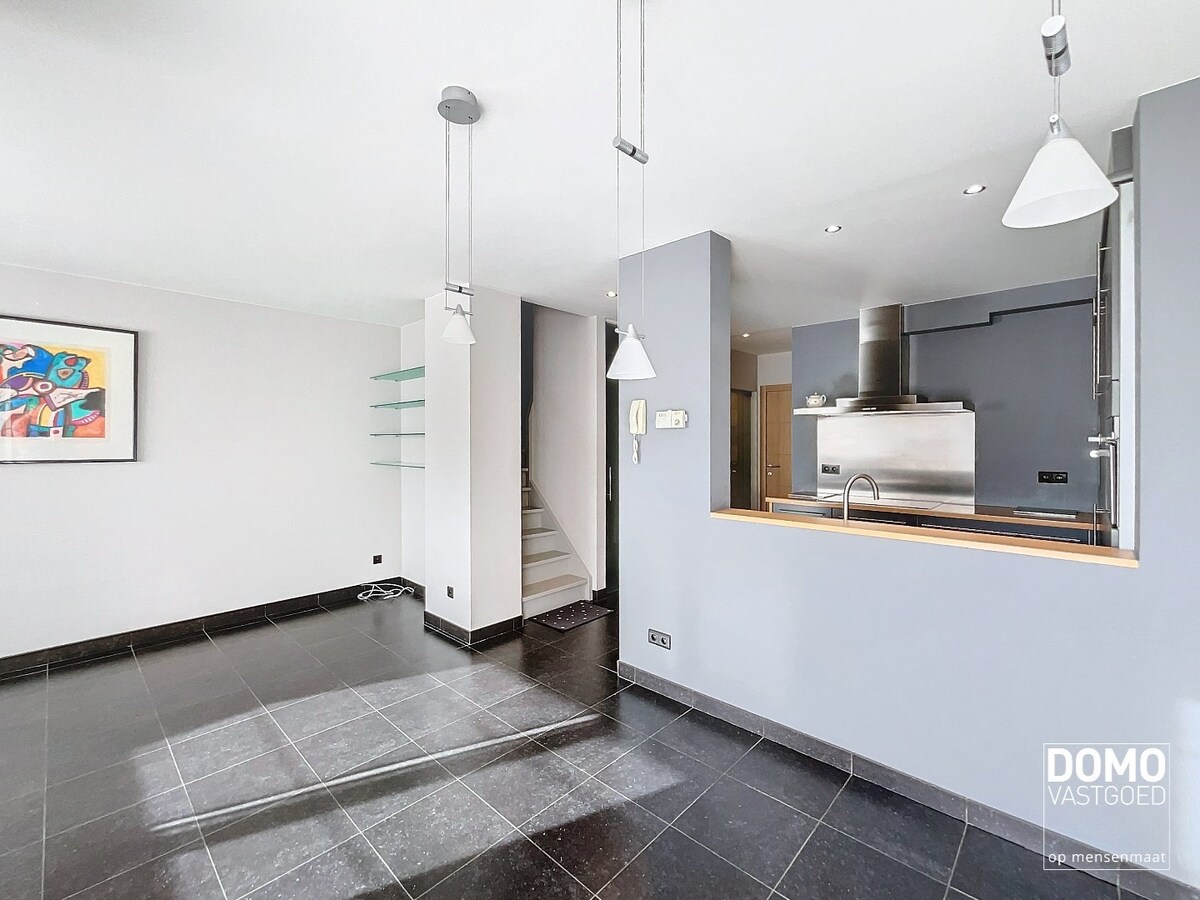 Duplex appartement met een gezellig tuintje, ondergrondse autostandplaats en 2 slaapkamers te Spalbeek - energielabel B, 109m² bewoonbare oppervlakte 