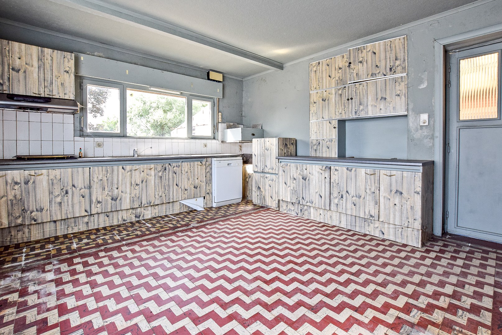 Woning met een enorm potentieel aan bruikbare oppervlakte op 1441m². 