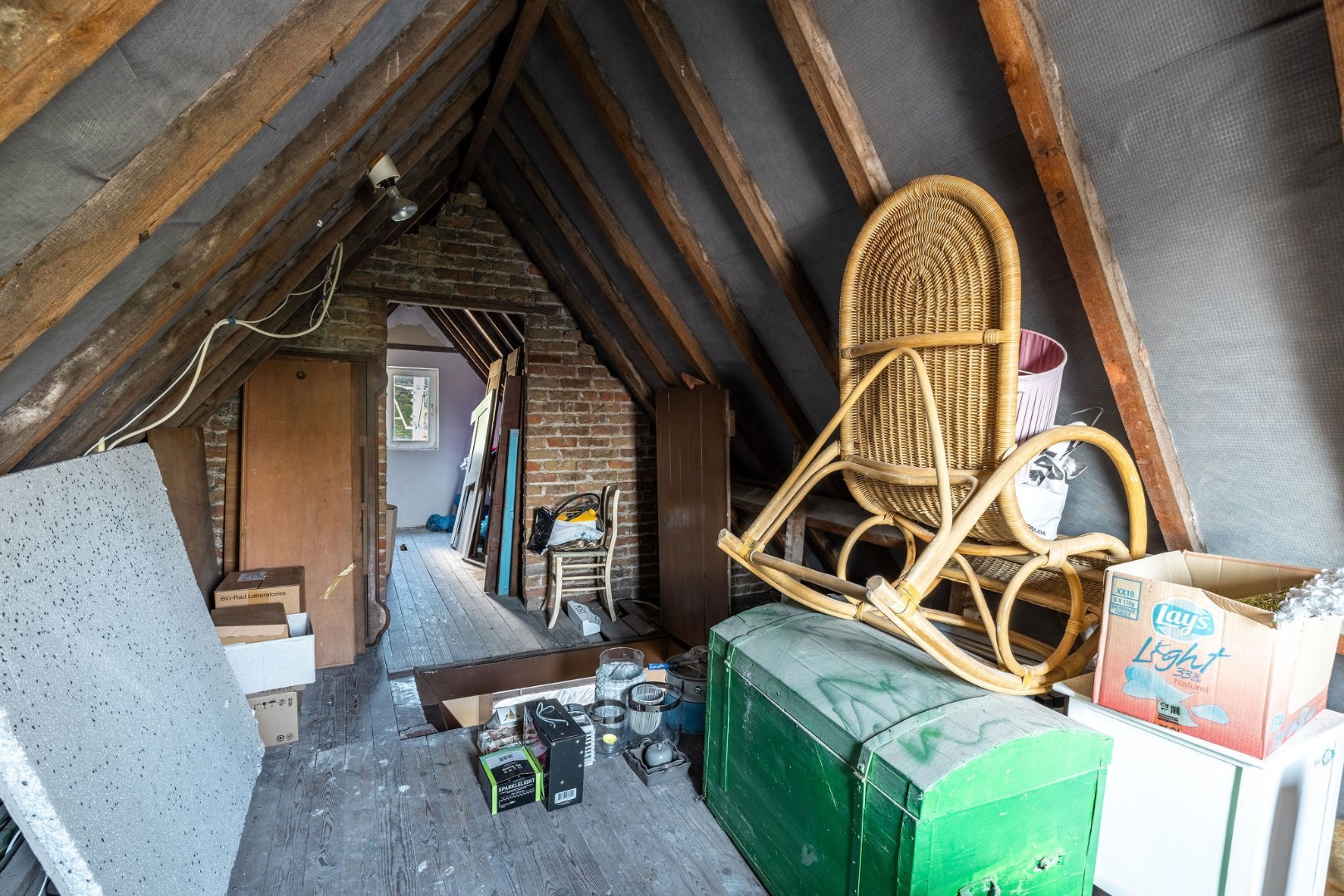 Authentieke woning met zonnige tuin, garage en bouwgrond 