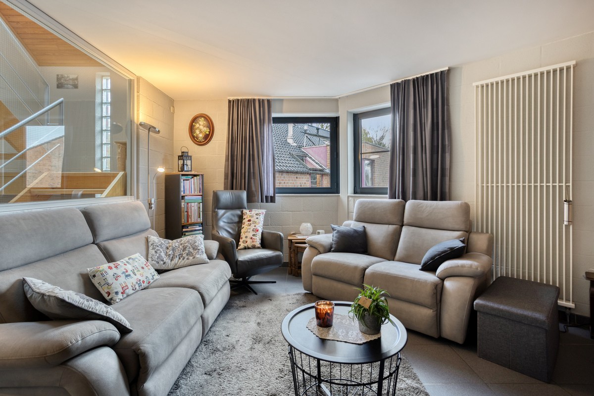 Instapklare halfopen bebouwing met 3 slaapkamers, tuin, terras en 2 carports in Kessel-Lo! – EPC 166 kWh/m² - bewoonbare opp. 146 m² 