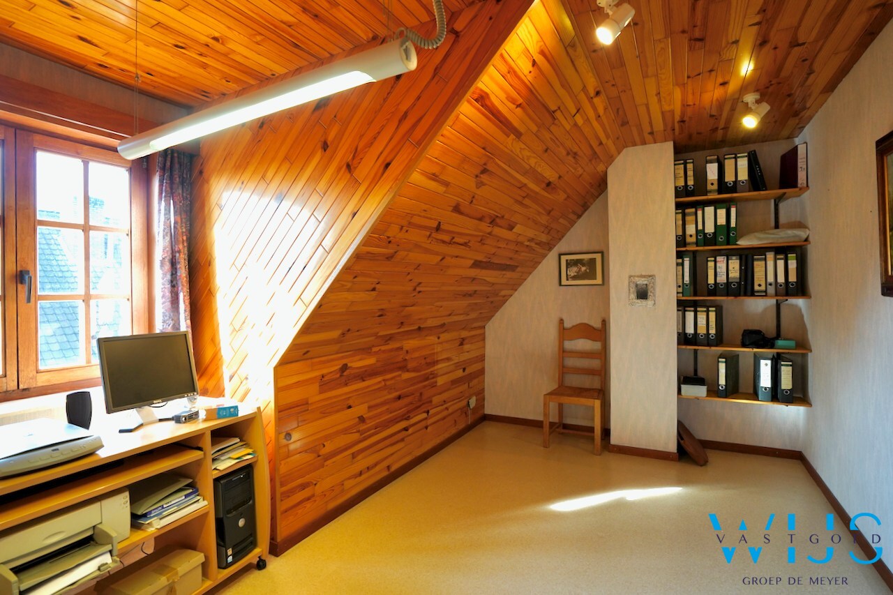 Fantastische open bebouwing met dubbele garage in gegeerde woonwijk te Evergem 