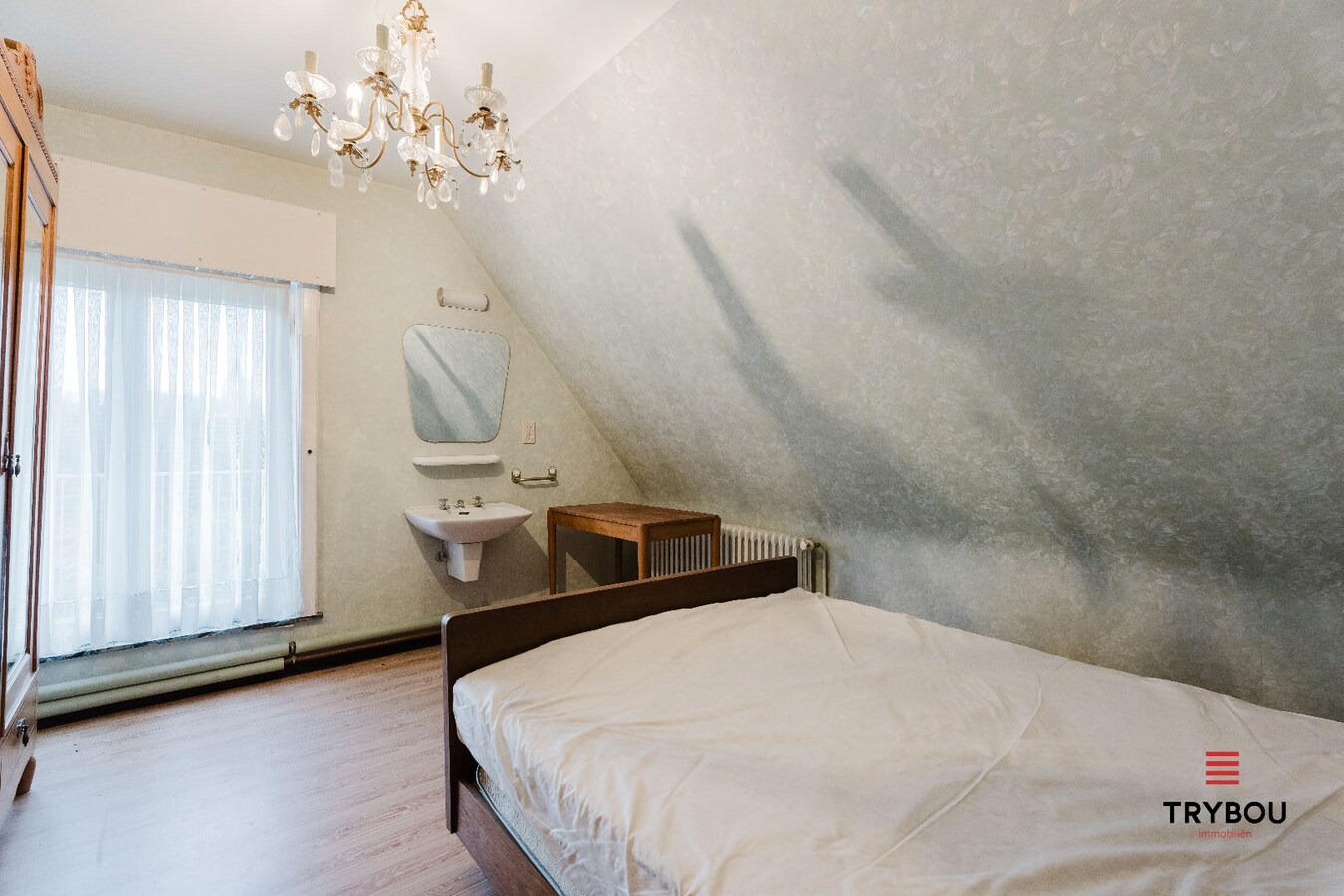 Ruime woning op groot perceel van 573 m² te Merkem. 