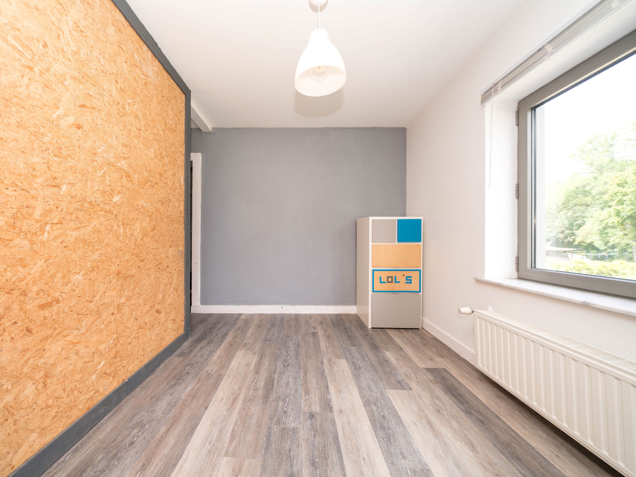 Gerenoveerde woning met 4 kamers, garage en stadstuintje 