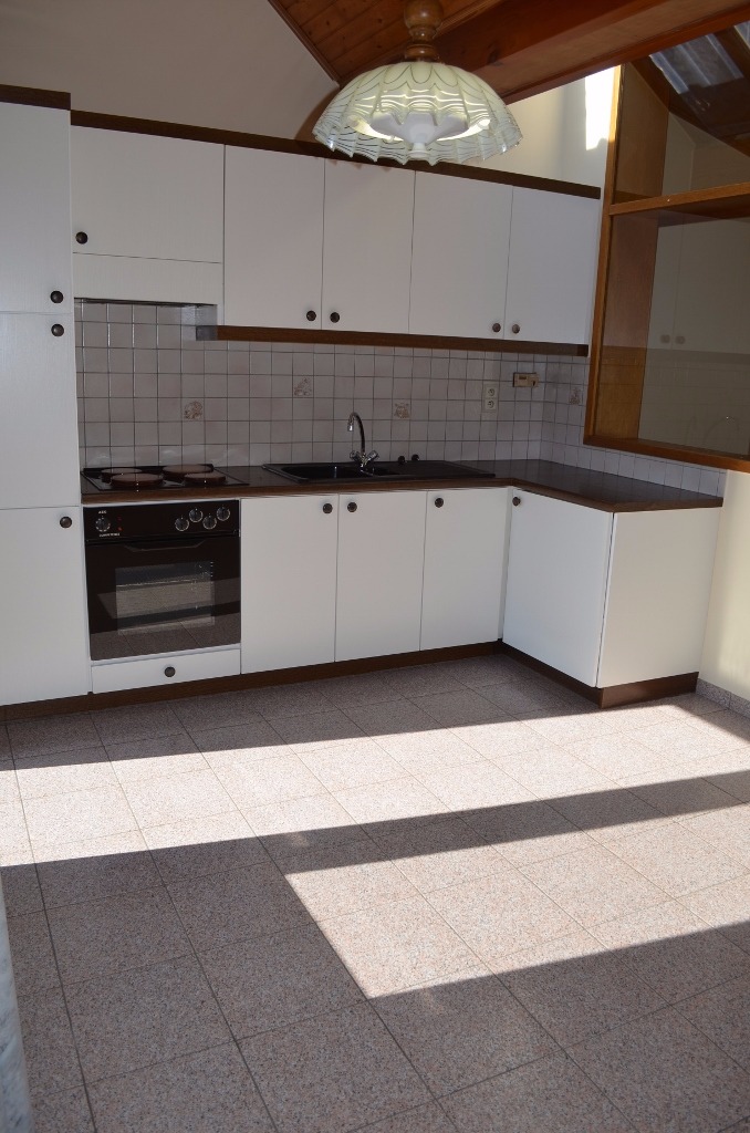 Rijwoning met 2 slpks en tuin te Adegem 