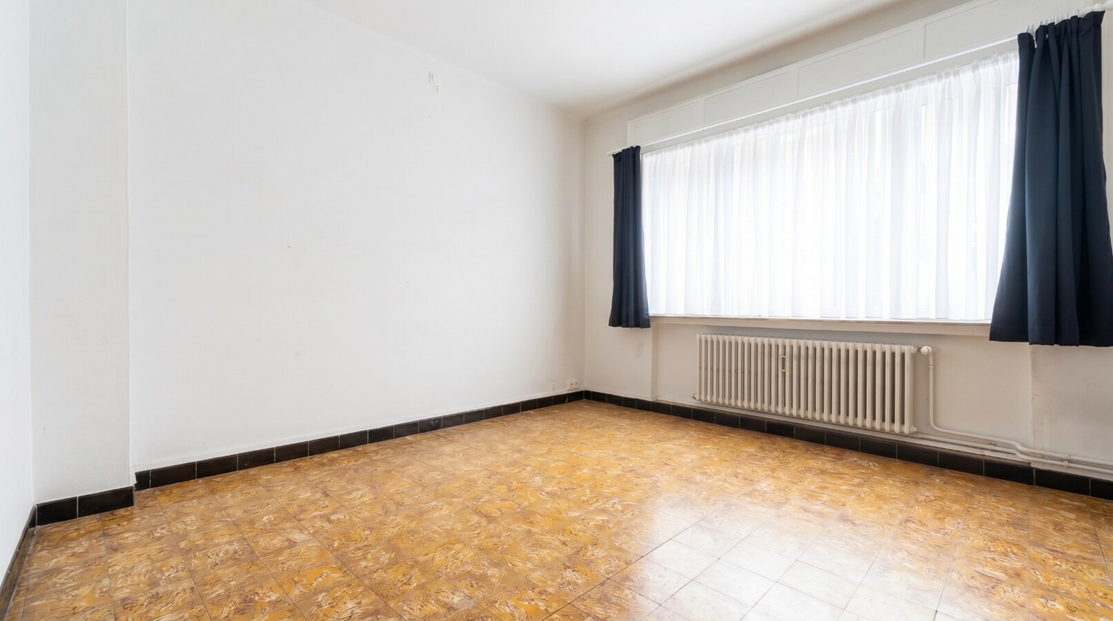 Appartement rez-de-chaussée avec cour, en plein centre-ville ! 
