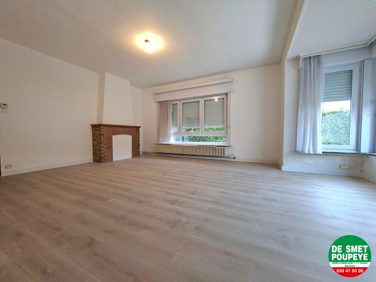 Gelijkvloersappartement met terras en garage 