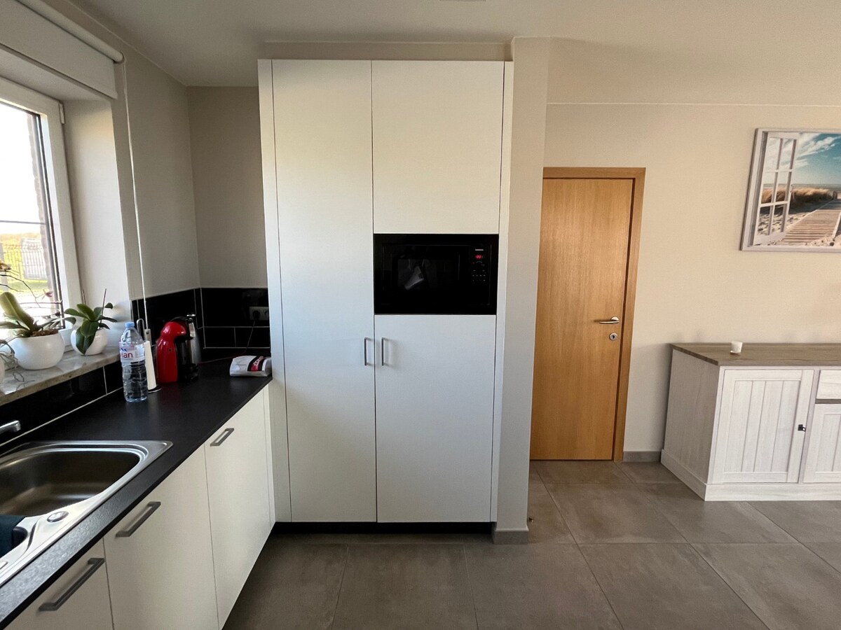 Luxueus én ruim gelijkvloers appartement in rustige omgeving. 