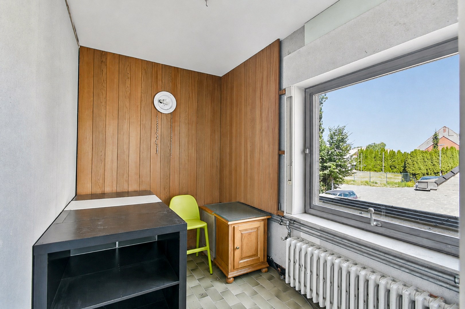 Woning met drie slaapkamers, garage en zonnige tuin 
