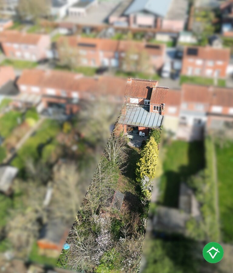 Stevige rijwoning met 4 slaapkamers, tuin en garage te Roeselare 