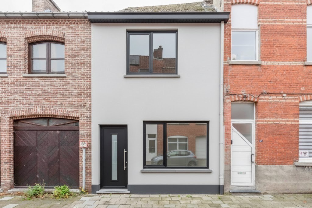 Charmante rijwoning te koop met koer en uitbreidingsmogelijkheden in Melle 