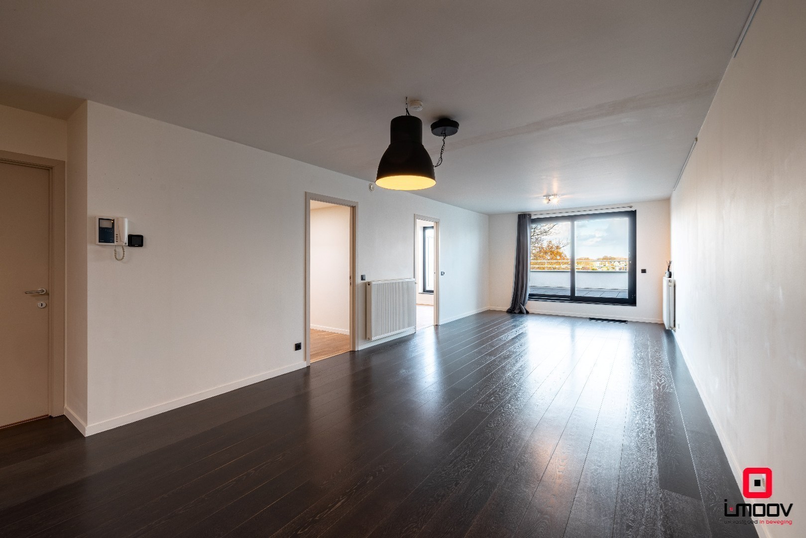 Lichtrijk en modern tweeslaapkamer appartement met groot terras in Oostakker 